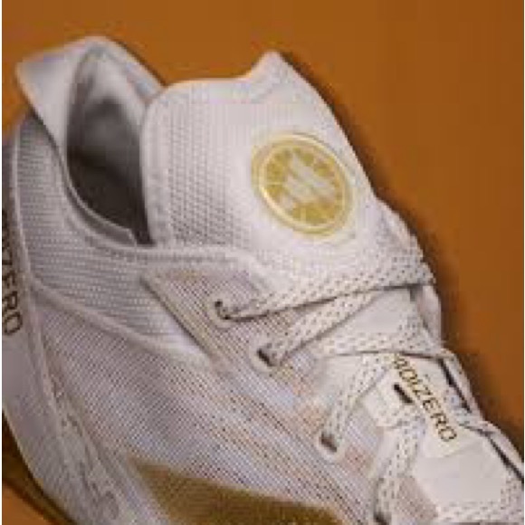 Adidas White and Gold Athletic Cleats - Picture 5 of 7